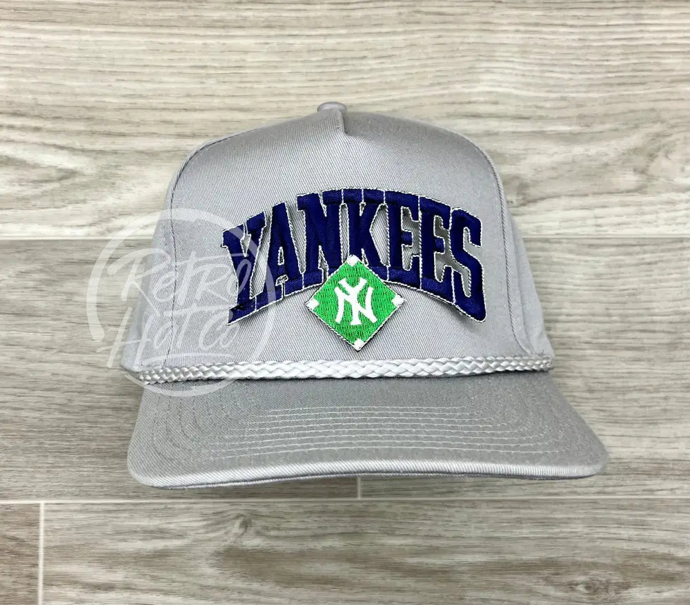 Vintage 90s New York Yankees (Navy Arch) Patch on Tall Gray Retro Rope