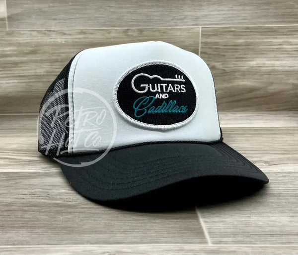 Guitars & Cadillacs (Oval) On Black/White Meshback Trucker Hat Ready To Go