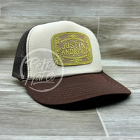 Justin Andrews Gold Buckle Patch On Beige/Brown Meshback Trucker Hat Ready To Go
