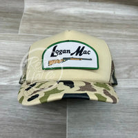 Logan Mac Rifle Patch On Solid Front Beige / Camo Meshback Trucker Hat Ready To Go