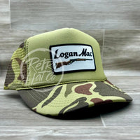 Logan Mac Rifle Patch On Solid Front Camo Meshback Trucker Hat Ready To Go