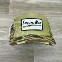 Logan Mac Rifle Patch On Solid Front Camo Meshback Trucker Hat Ready To Go